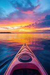 Kayak boat in tropical sea water at sunset