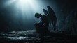 © Dara - A dark, dramatic depiction of a fallen angel with torn wings, kneeling on a rocky surface, illuminated by a faint light from above.