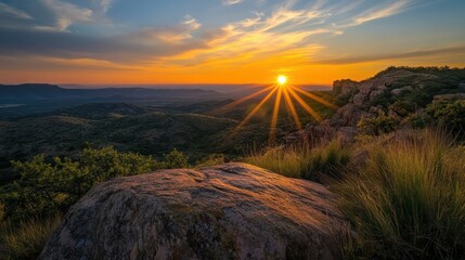 Poster - A large rock sits on a hillside overlooking a valley
