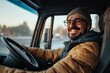 © Vladimir - A smiling man in a truck, suitable for transportation and logistics-themed designs, promoting happiness and friendly service.