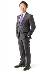 Wall Mural - Smiling Asian businessman in grey suit with purple tie, exuding confidence and professionalism. This portrait captures modern professional look ideal for corporate settings