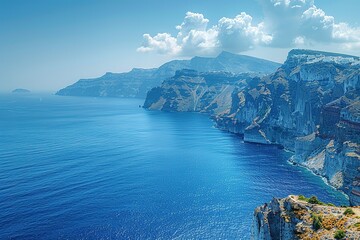 Wall Mural - A beautiful blue ocean with a mountain range in the background