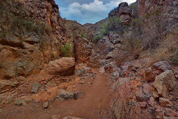 Northern Kyrgyzstan. Picturesque winding trails of the Kok Moinok canyons with red-brown rock along the Chu River.