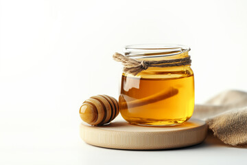 Natural honey in a jar that highlights honeycomb isolated on white transparent background