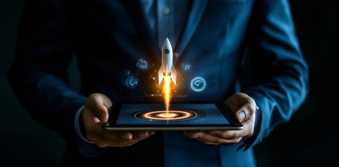 Wall Mural - A close up of a businessman using a tablet with glowing rocket on a blue background, with a mock up of the place and a mock up of the digital transformation concept.