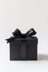 Wall Mural - Elegant Matte Black Gift Box with Satin Ribbon for Special Occasions and Celebrations