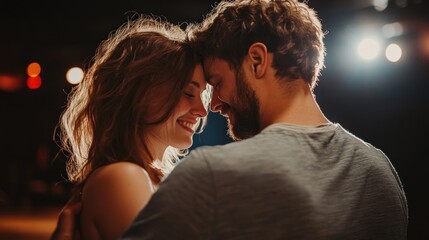 Wall Mural - A man and a woman are hugging in a theater