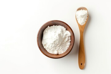 Sticker - Bird s eye view of spoon and bowl of corn starch on white background