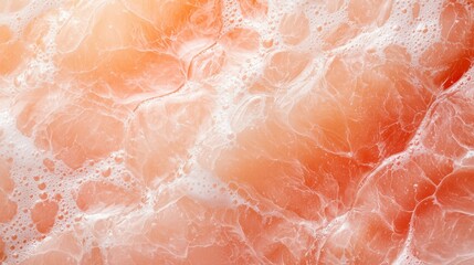 Wall Mural -  A tight shot of oranges submerged in water, with gentle bubbles forming on the surface