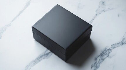 Poster - A matte black box is slightly open, revealing a sleek interior against a pristine white marble surface. The design embodies modern minimalism, perfect for stylish presentations