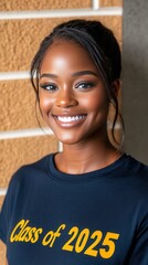 Wall Mural - Portrait of a black woman in a graduation t-shirt with text 