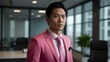 © Alteisen Riese - adult black hair asian man in pink formal attire model portrait looking confident on an office background for ad concept space for text