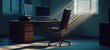 © Ibad - An abandoned office chair, with its shadow cast across a desk and a computer monitor