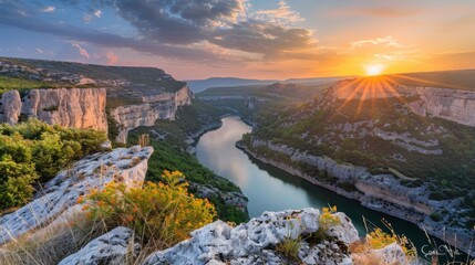 Breathtaking Sunset Over a Serene River Valley Surrounded by Dramatic Cliffs and Lush Green Landscape