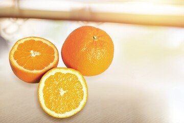 Sticker - Fresh ripe juicy orange fruit with leaves