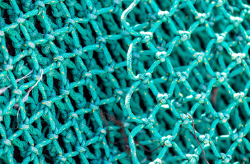 macro close up of a green fishing net