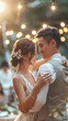 © sommersby - A newlywed couple shares a loving dance surrounded by soft lights, celebrating their union at a romantic outdoor wedding venue in the evening