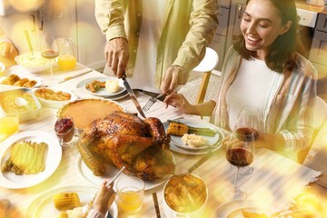 Happy family having dinner at festive table on Thanksgiving Day