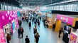 © Sumet - A bustling trade show showcasing vibrant booths and diverse attendees networking in a modern exhibition hall.