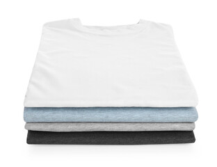 Poster - Stack of clean colorful t-shirts isolated on white