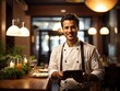 © shrinay - smiling male chef holding a tablet to welcome customers