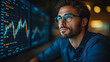 © CreativeIMGIdeas - A man wearing glasses is looking at a computer screen with multiple graphs. The man is focused and attentive, possibly analyzing the data on the screen