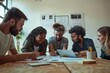 © kitipol - Office setting with team brainstorming and collaborating on project