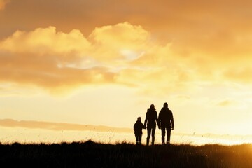 Serene silhouette of a family watching the sunset