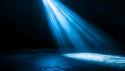 A single blue spotlight illuminates a dark room, creating a dramatic and mysterious atmosphere.