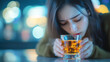 © Your Hand Please - woman gazes down while holding a glass of whiskey, symbolizing emotional turmoil, depression, and the struggles of coping with inner conflict and life's hardships