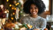 © zen - Asia selective focus of joyful african american woman serving vegetables during festive dinner on thanksgiving day