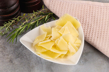 Canvas Print - Parmesan cheese slices in the bowl