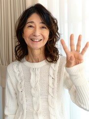 Canvas Print - A woman smiles and holds up four fingers. AI.