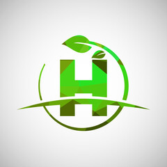 Wall Mural - English alphabet H with circle leaf and swoosh. Eco-friendly logo concept. Low poly logo for ecological business and company identity