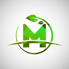 Wall Mural - English alphabet M with circle leaf and swoosh. Eco-friendly logo concept. Low poly logo for ecological business and company identity