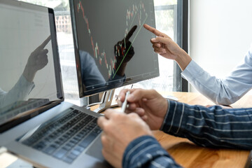 Aufkleber - Business trader team checking stock market online analyzing graph data on laptop screen to brainstorming about trading online while working together in office