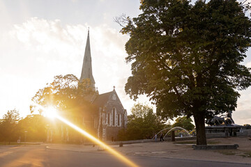 Family with children and pet dog, kids and adults visiting Coppenhagen , capital city of Denmarn during summer