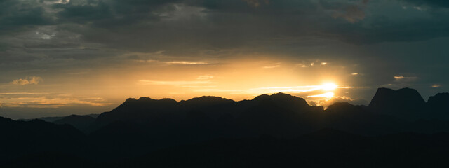 Wall Mural - majestic mountain at sunset with sky and cloudscape, beautiful landscape captured in the evening lig