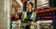 © Nina2024/peopleimages.com - Warehouse, woman and tablet for stock management, logistic or quality control in inspection. Female person, tech and maintenance in freight, supply chain or factory for shipping company as supervisor