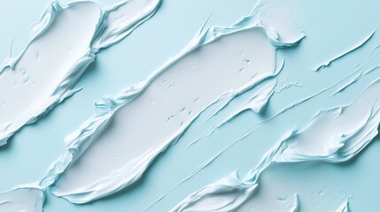 Poster - Creamy texture spread across a light blue backdrop creates an artistic abstract design resembling skincare or artistic paint application
