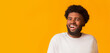 © Prostock-studio - Excited african guy looking at empty space, happy to see good offer, panorama