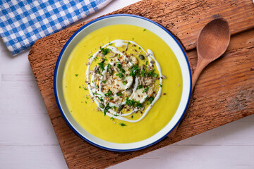 Vegan and healthy vegetable soup. Top view table with  decoration.