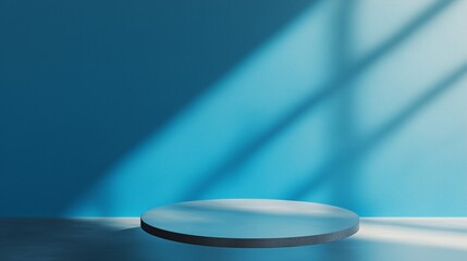 Poster - A minimalistic blue backdrop featuring a round platform illuminated by soft, natural light creating an artistic atmosphere