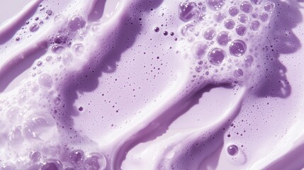 Poster - close-up view of purple liquid with bubbles and waves creating a soothing texture in bright light