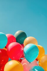 Colorful Balloons Floating in Blue Sky. Vibrant Celebration Image