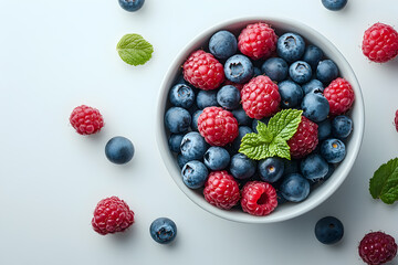 Poster - A bowl of fresh berries, scattered on a white background