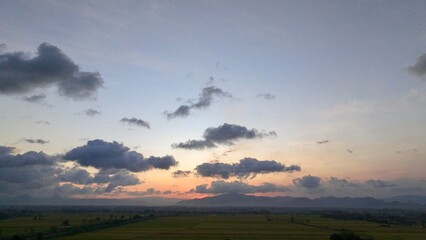 beach dawn, sunrise. evening sky with clouds. golden hours. afternoon vanilla sky. seashore sunburn 