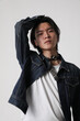 © face_reader_img - Stylish handsome young Asian man posing indoor over white background. Mock-up.