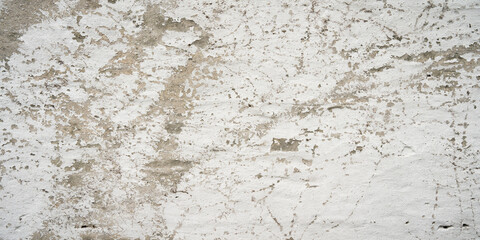 Fototapete - Peeling white paint on a old house wall. Background for a weathered old wall structure. space for text.