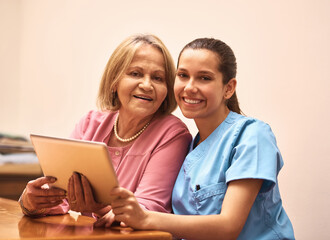 Wall Mural - Healthcare, portrait and tablet of nurse with old woman in assisted living home for diagnosis or results. Medical, smile or tech with caregiver and senior patient in clinic together for consulting